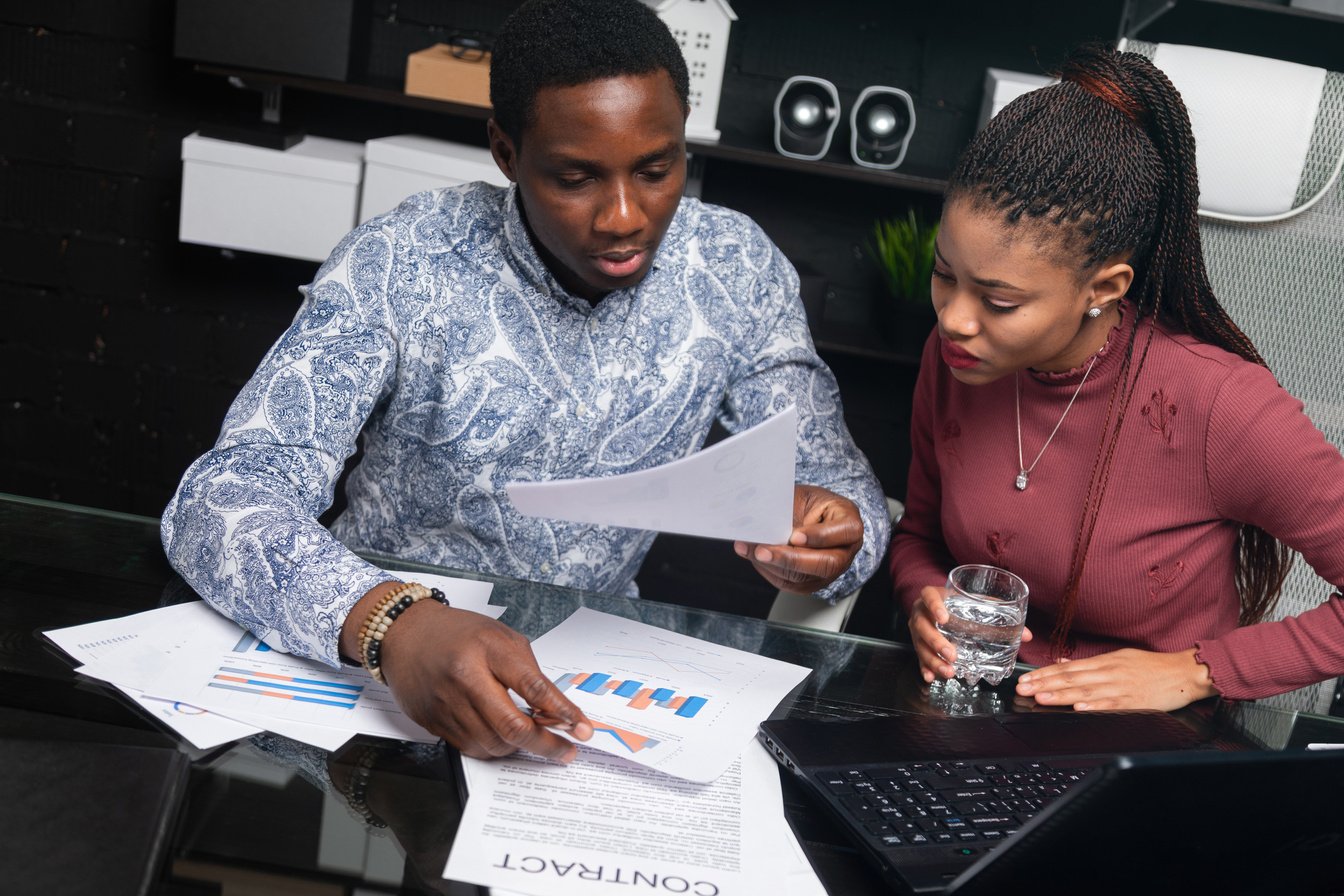 Colleagues Planning on a Report